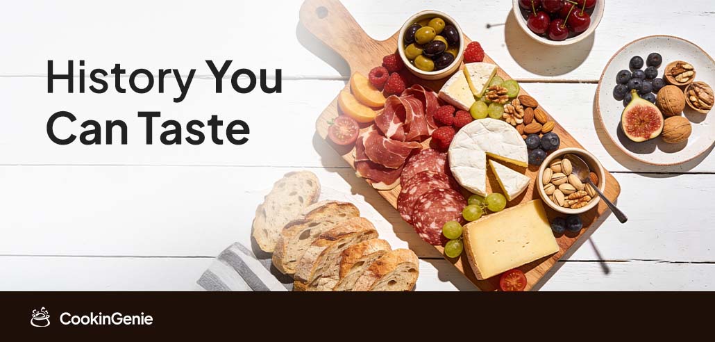 Charcuterie board with meats, cheese, fruit, and bread