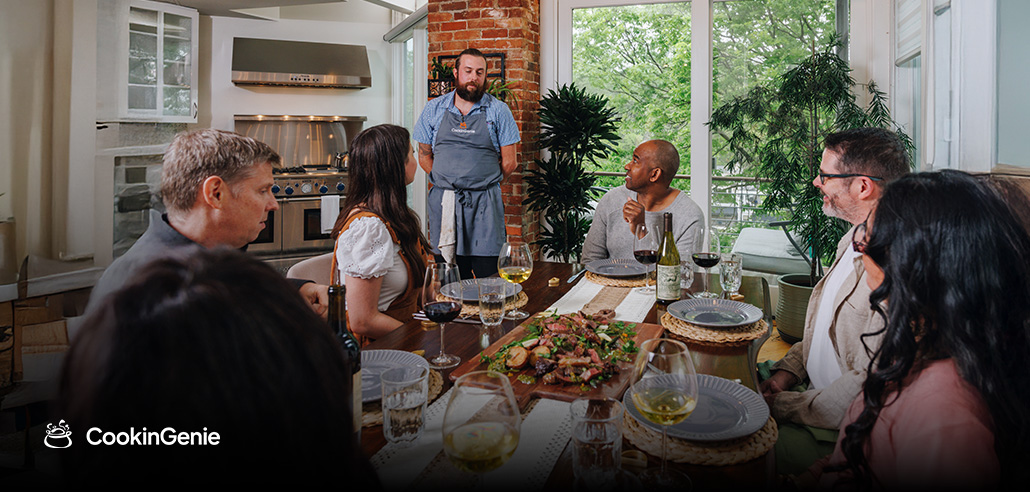 Personal chef serving dinner to guests at home