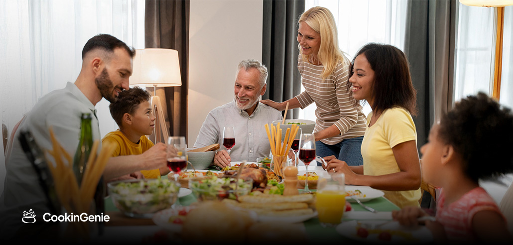 Family celebrating a woman’s 50th birthday with a private chef meal at home