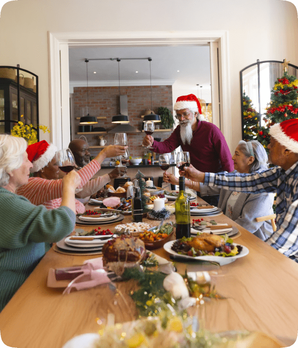 Family celebrating Christmas dinner at home
