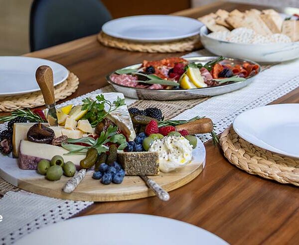 Custom charcuterie board with cheeses, berries, and cured meats for private dining